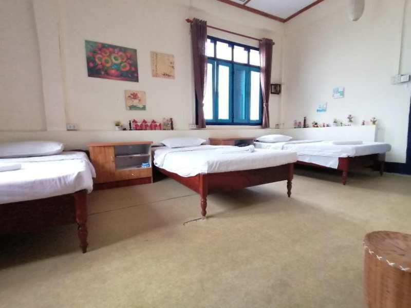 לואנג פרבאנג Viradesa Guesthouse מראה חיצוני תמונה