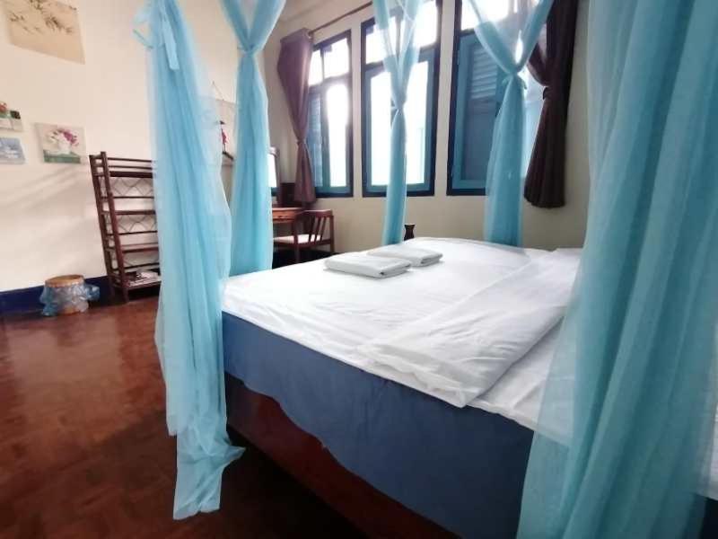 לואנג פרבאנג Viradesa Guesthouse מראה חיצוני תמונה