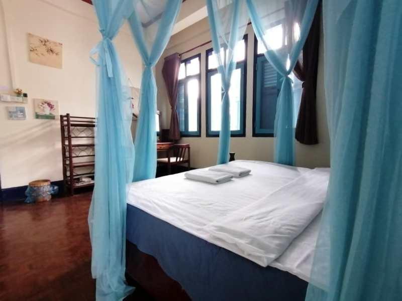 לואנג פרבאנג Viradesa Guesthouse מראה חיצוני תמונה